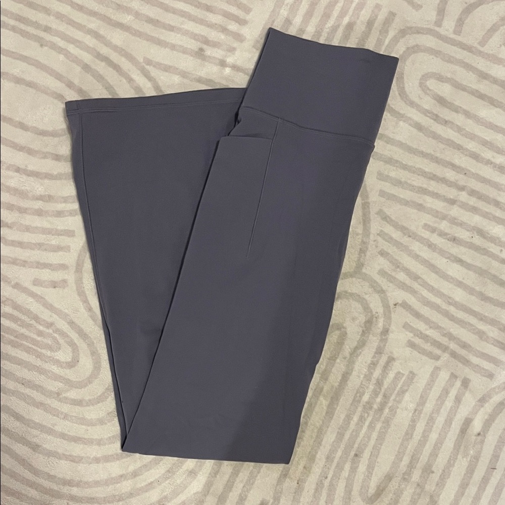 Athleta Salutation Stash Flare Pocket Leggings in Dusk Violet